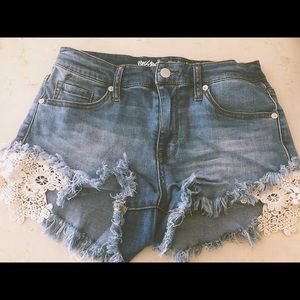 Blue jean shorts with a drill lace detail